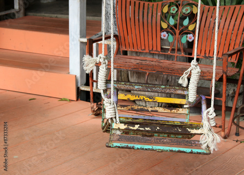 rusty iron seat swing