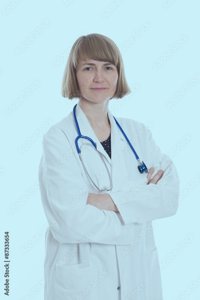 young female doctor with crossed arms young female doctor with crossed arms
