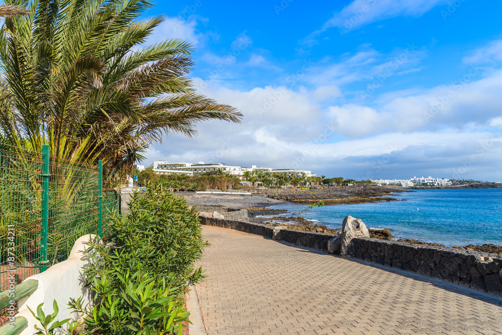 Promenade along ocean coast in Playa Blanca, Lanzarote, Canary Islands, Spain