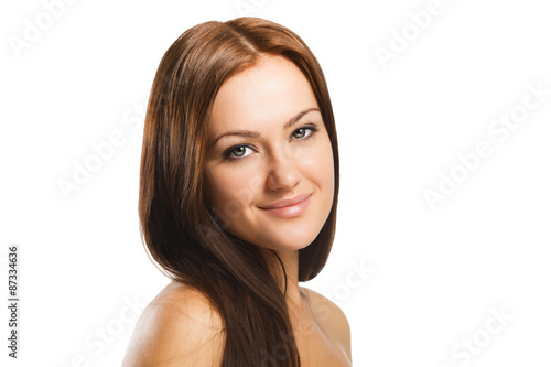 Beauty portrait of young woman with natural makeup isolated in w