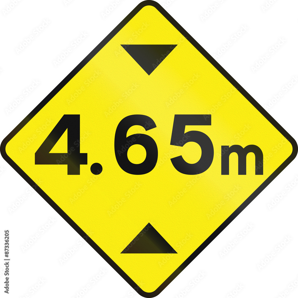 Warning road sign in Ireland: Height restriction ahead in meters Warning road sign in Ireland: Height restriction ahead in meters