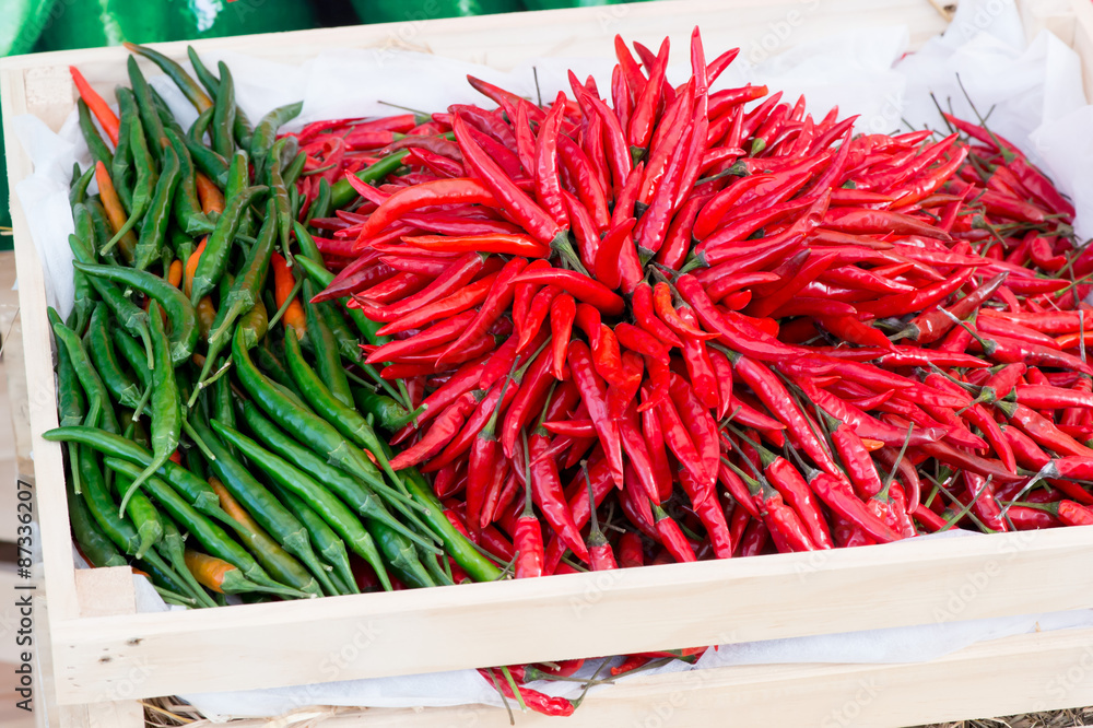 Naklejka premium Chili Peppers in basket