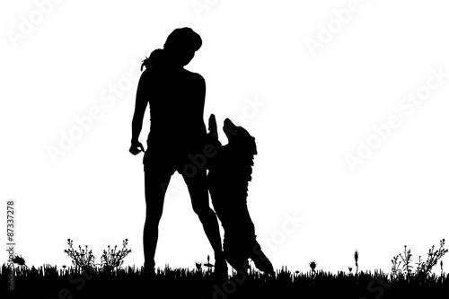 Vector silhouette of a woman with a dog.