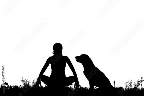Vector silhouette of a woman with a dog.