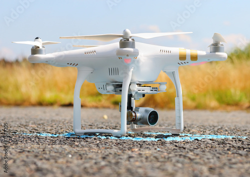 Drone quadrocopter with high resolution digital camera. New tool for aerial photo and video. 