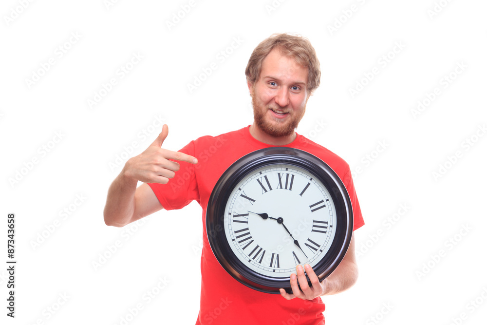 Bearded happy man holding big clock and smiling Bearded happy man holding big clock and smiling