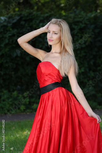 Lady in red outdoors