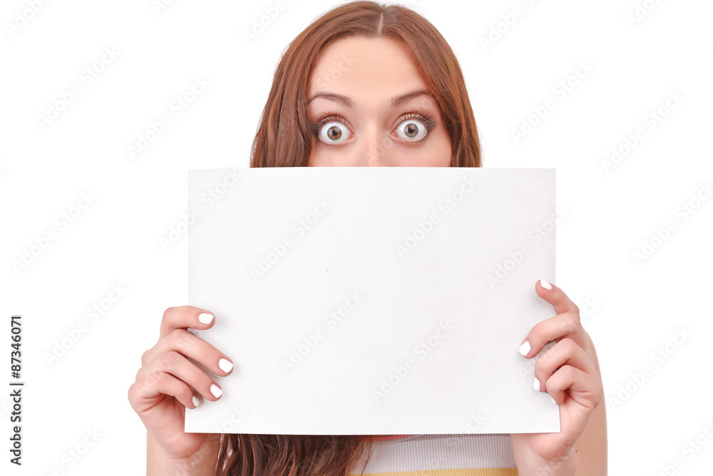 Pretty red-haired woman holding paper board Pretty red-haired woman holding paper board