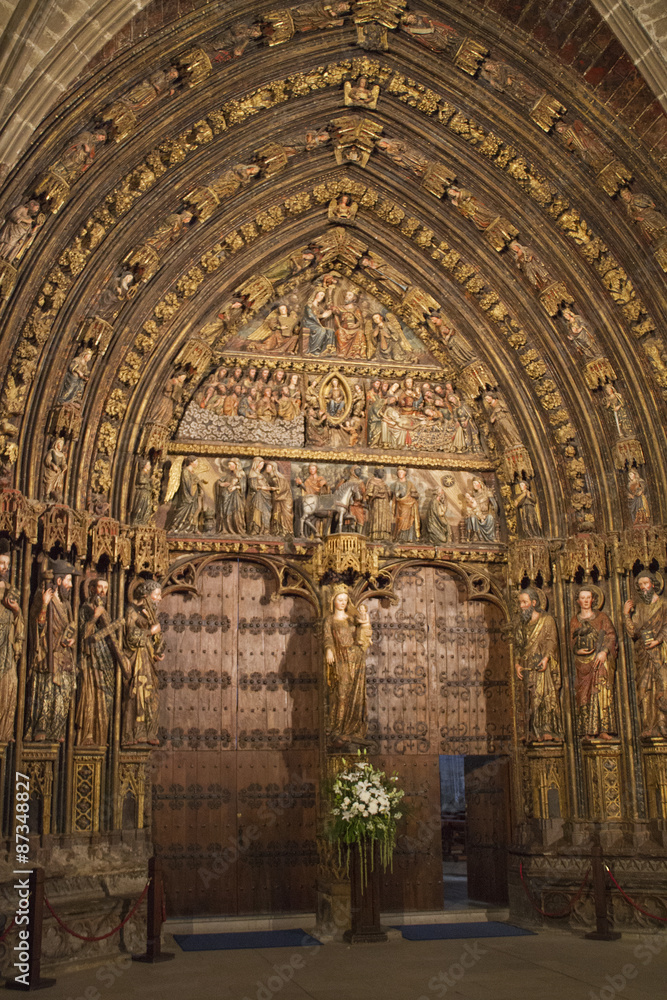 Wood carved polychrome portal from the 14th century in the Church of Santa Maria de los Reyes(Saint Mary of the Kings).Laguardia,Spain