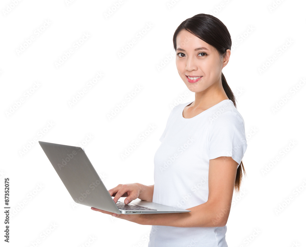 Woman use of the notebook computer Woman use of the notebook computer