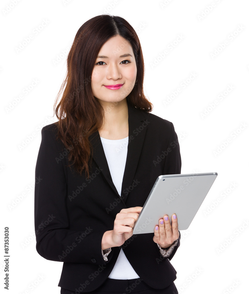 Asian Businesswoman use of the tablet pc Asian Businesswoman use of the tablet pc