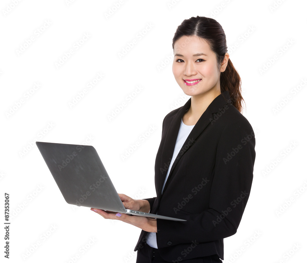 Confident Businesswoman use of the notebook computer Confident Businesswoman use of the notebook computer