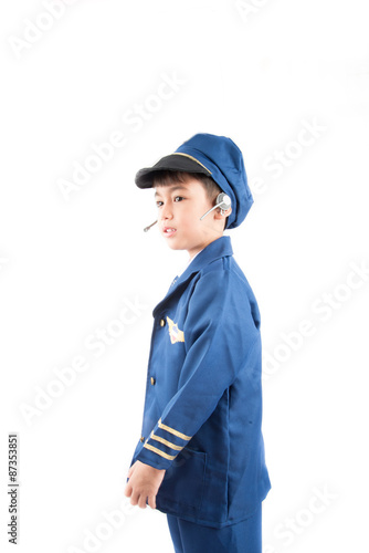 Little boy pretend as a pilot on white background