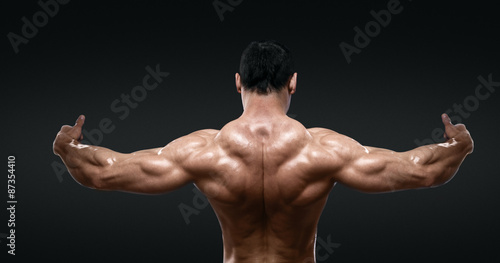 Rear view of healthy muscular young man