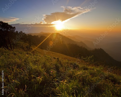 Majestic sunset in the mountains landscape. Dramatic sky