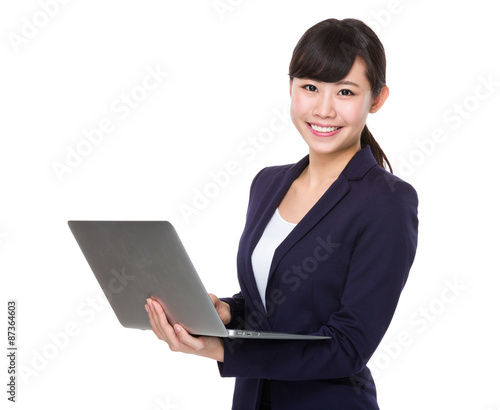 Young businesswoman use of the laptop computer © leungchopan