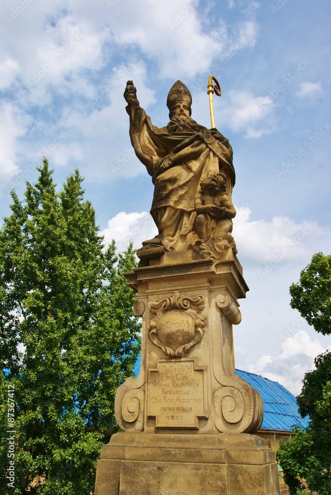 Святой Августин скульптура на Карловом мосту в Праге