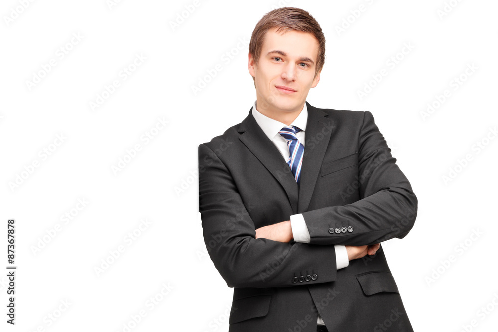 Young businessman leaning against wall Young businessman leaning against wall