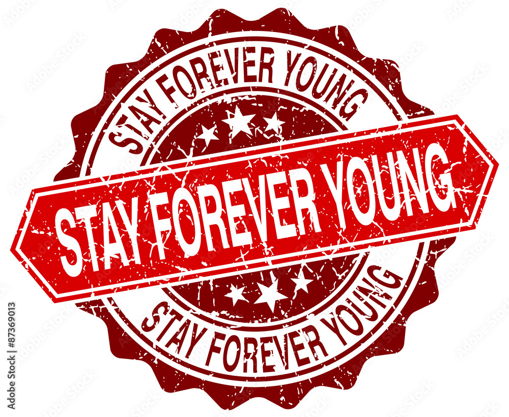 Obraz premium stay forever young red round grunge stamp on white
