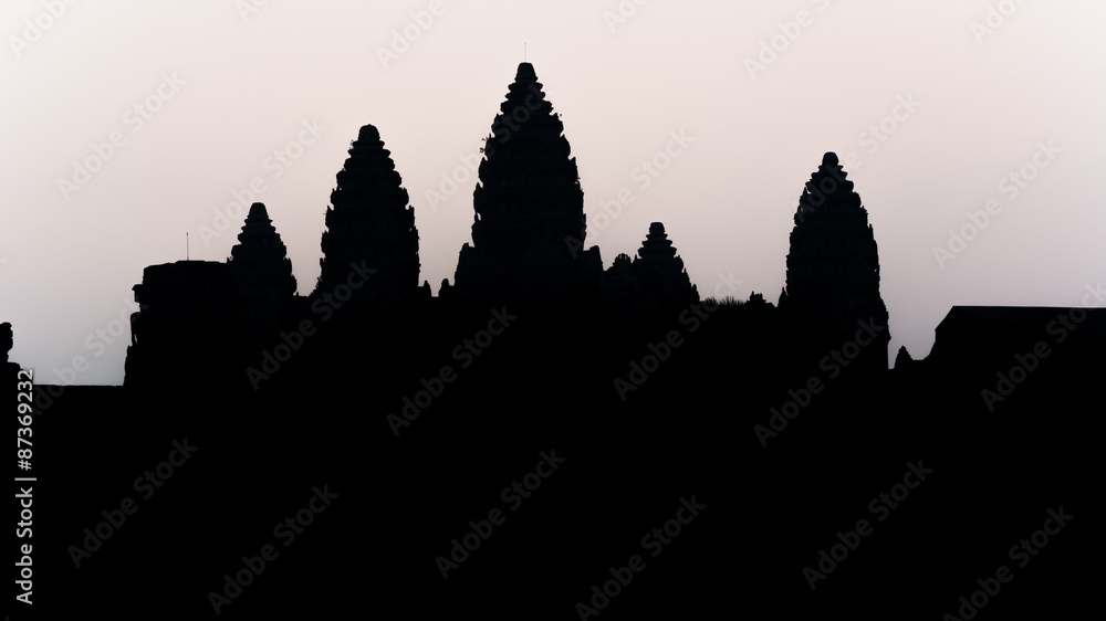 a silhouette of the famous angkor wat temple in cambodia
