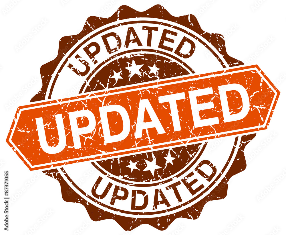 Obraz premium updated orange round grunge stamp on white