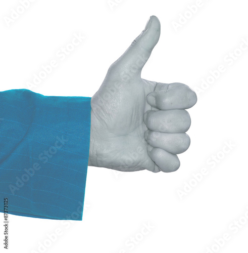 Human hand makes thumbs up in blue effect