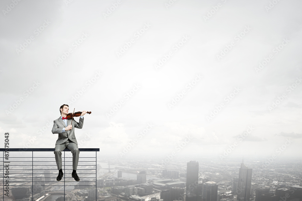 Businessman play violin Businessman play violin