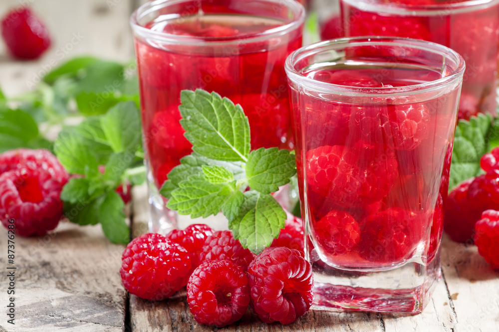 Red refreshing cocktail with raspberry and mint, selective focus Red refreshing cocktail with raspberry and mint, selective focus