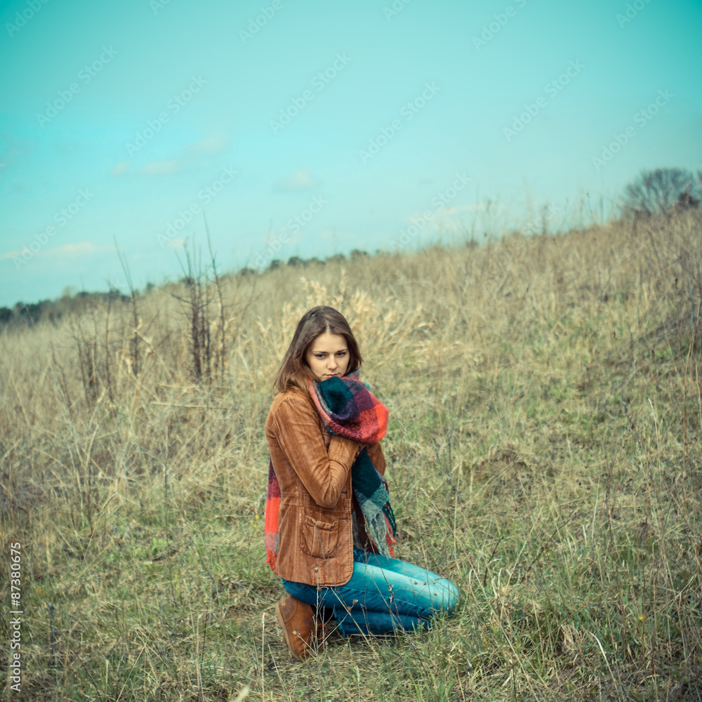 Beautiful girl praying outdoors Beautiful girl praying outdoors