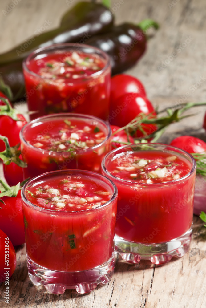 Traditional tomato soup gazpacho in a glass, selective focus Traditional tomato soup gazpacho in a glass, selective focus