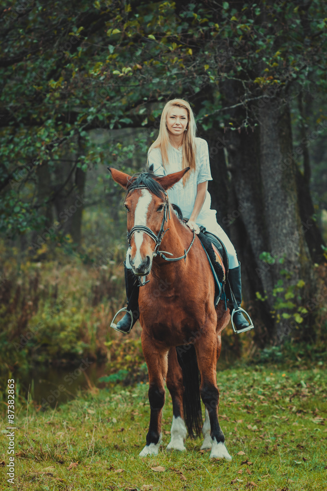 Romantic girl in a white horse. beautiful girl and a horse Romantic girl in a white horse. beautiful girl and a horse