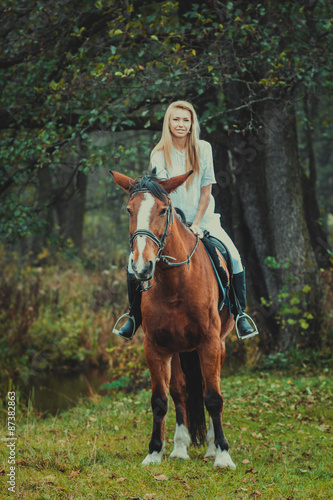 Romantic girl in a white horse. beautiful girl and a horse © ruslimonchyk