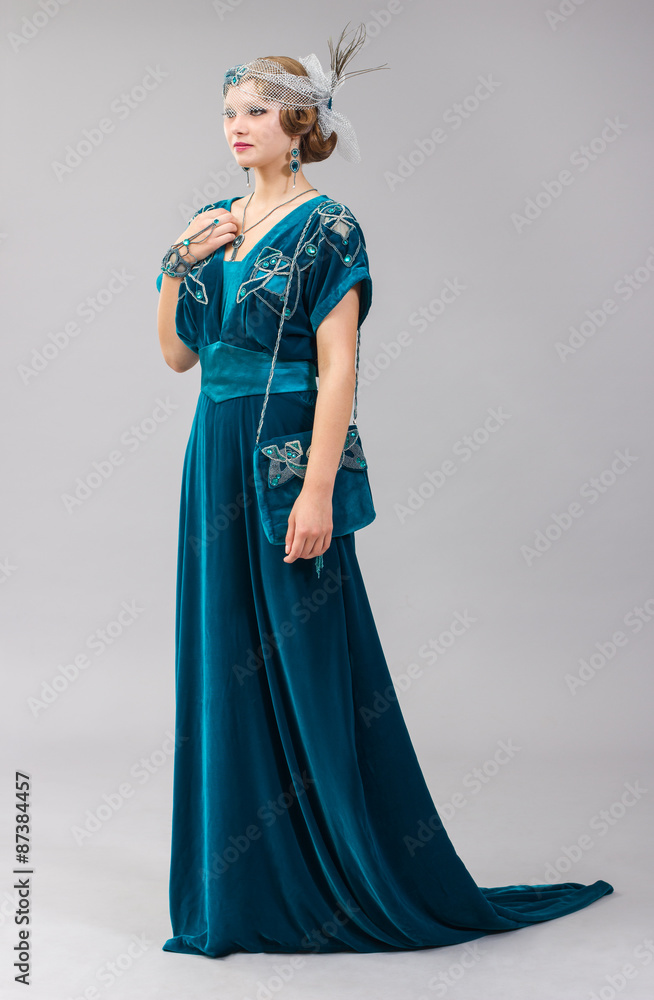 Beautiful elegant young woman with hairstyle and clothing in modern style in full view. Beautiful elegant young woman with hairstyle and clothing in modern style in full view.