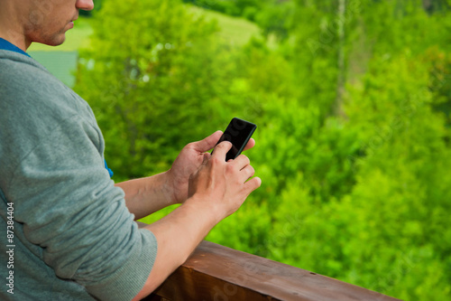 man hands touching smartphone