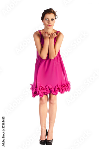 Young and sexy woman model in pink dress posing © -Marcus-
