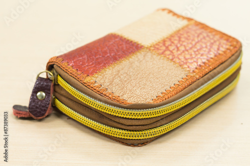 Leather female handbag, accessory background without people.