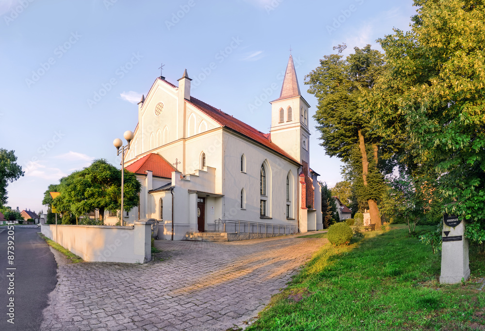 a small church at sunset in the city Dobzhen Wielki