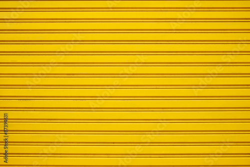 Yellow steel roller shutter door