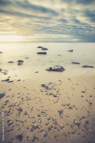 Sunrise over the sea. Beautiful long exposure landscape of rocky