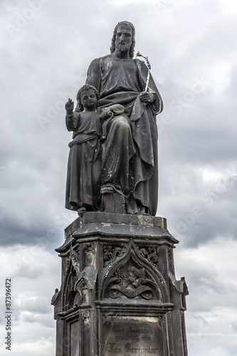 Statue on Charles Bridge (Karluv most, 1357). Prague, Czech Rep. © dbrnjhrj