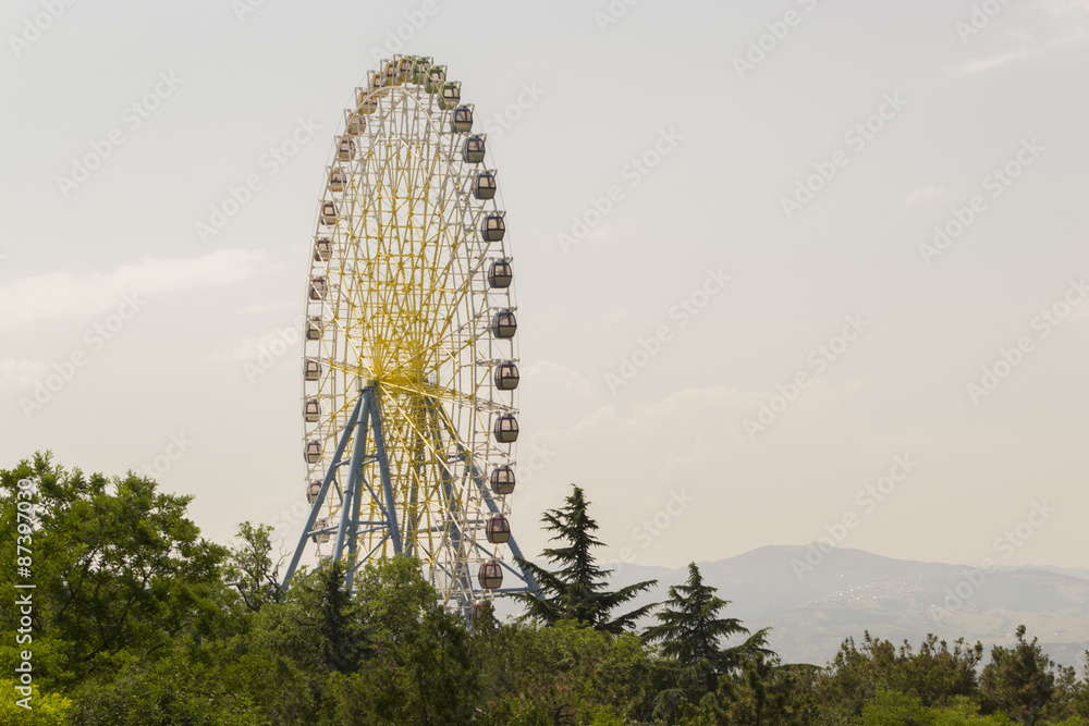Ferris wheel in theme park Ferris wheel in theme park