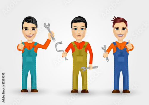 three young plumbers dressed in work clothes