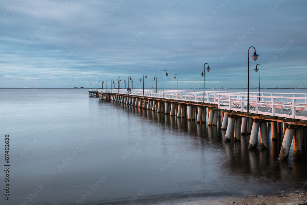 Obraz premium Gdynia Orlowo pier. Vintage photo of Baltic sea shore seascape.