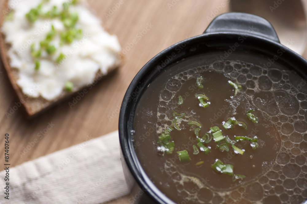 Mushroom soup served with lard spread with green onion Mushroom soup served with lard spread with green onion