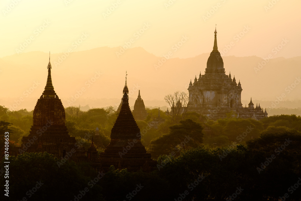Beautiful sunset scenic view with silhouettes of temples in Baga