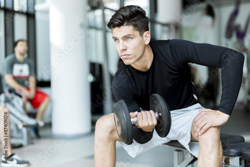 Young man training in a gym