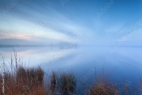 Fototapeta Naklejka Na Ścianę i Meble -  mist and cloudscape on wild lake
