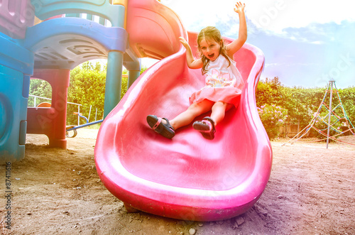 Happy Girl on Slide photo