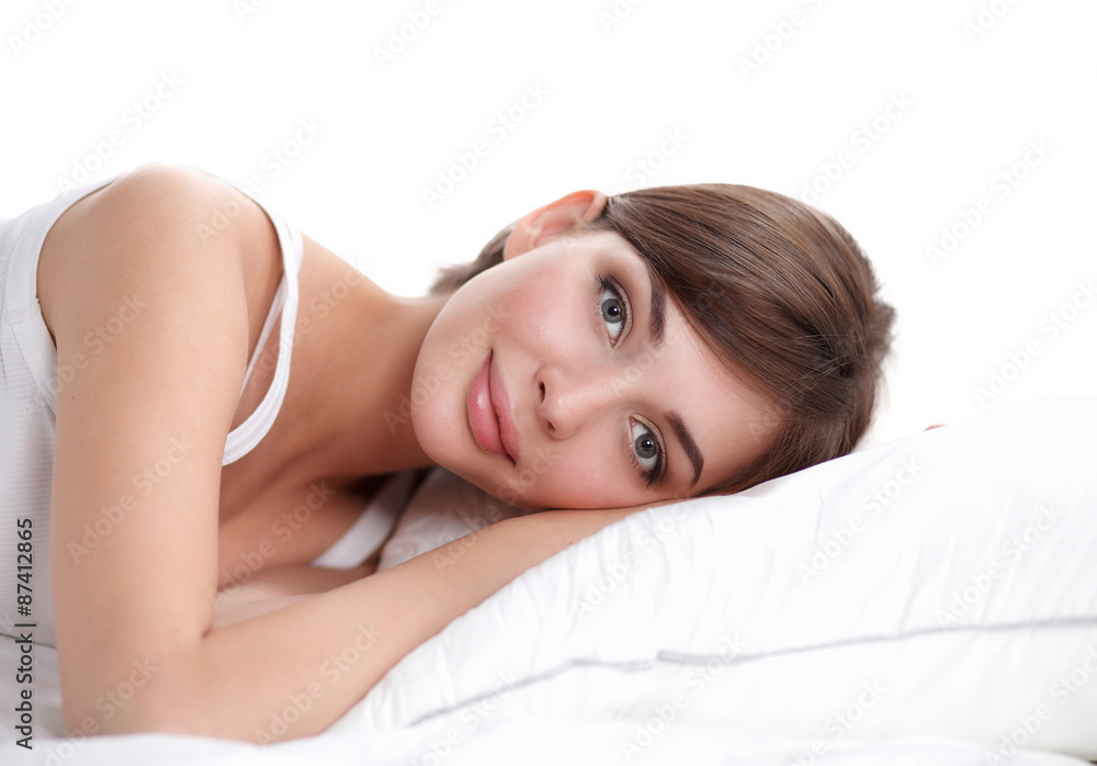 Beautiful girl lying in bedroom at early morning Beautiful girl lying in bedroom at early morning