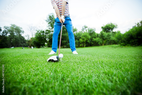 Golfer getting ready to take a shot